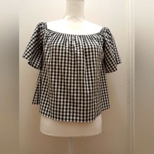 Express women's black and white gingham plaid smocked short sleeve top. (S)